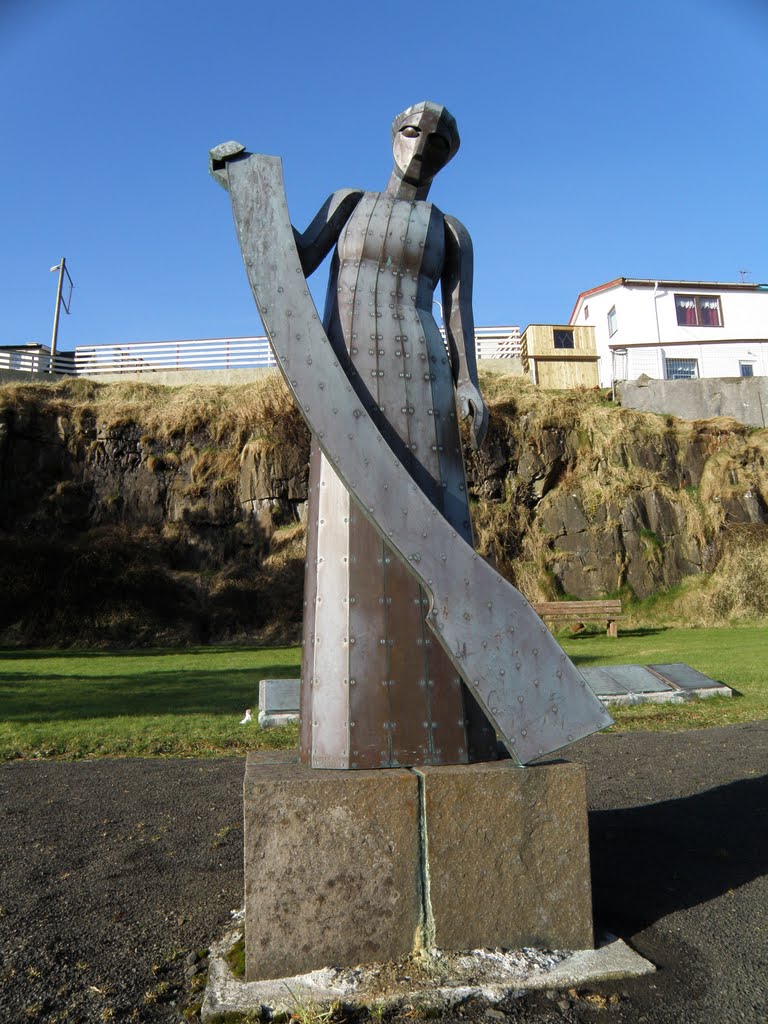 Memorial Statue in Vágur, In Memory of People Lost at Sea, Woman with Steer by Eileen Sandá