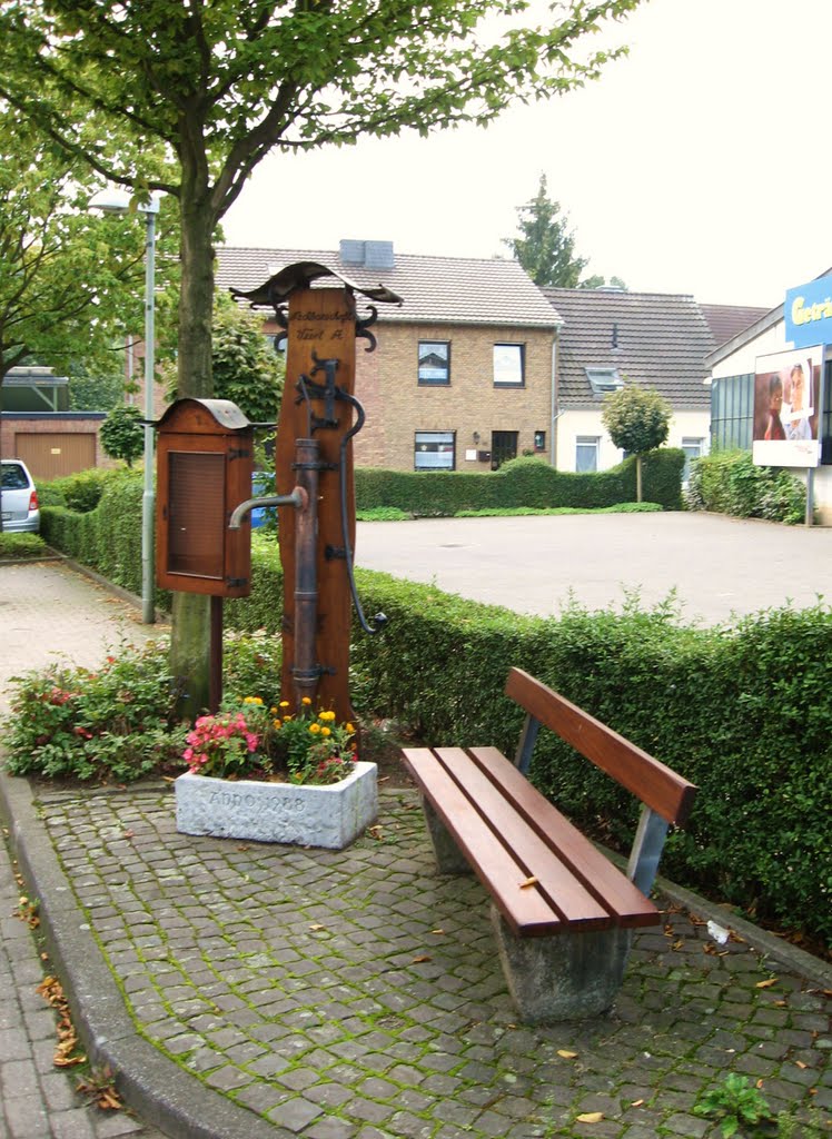 Bank an einer "Nachbarschaftspumpe" in Geldern ... by eichhörnchen