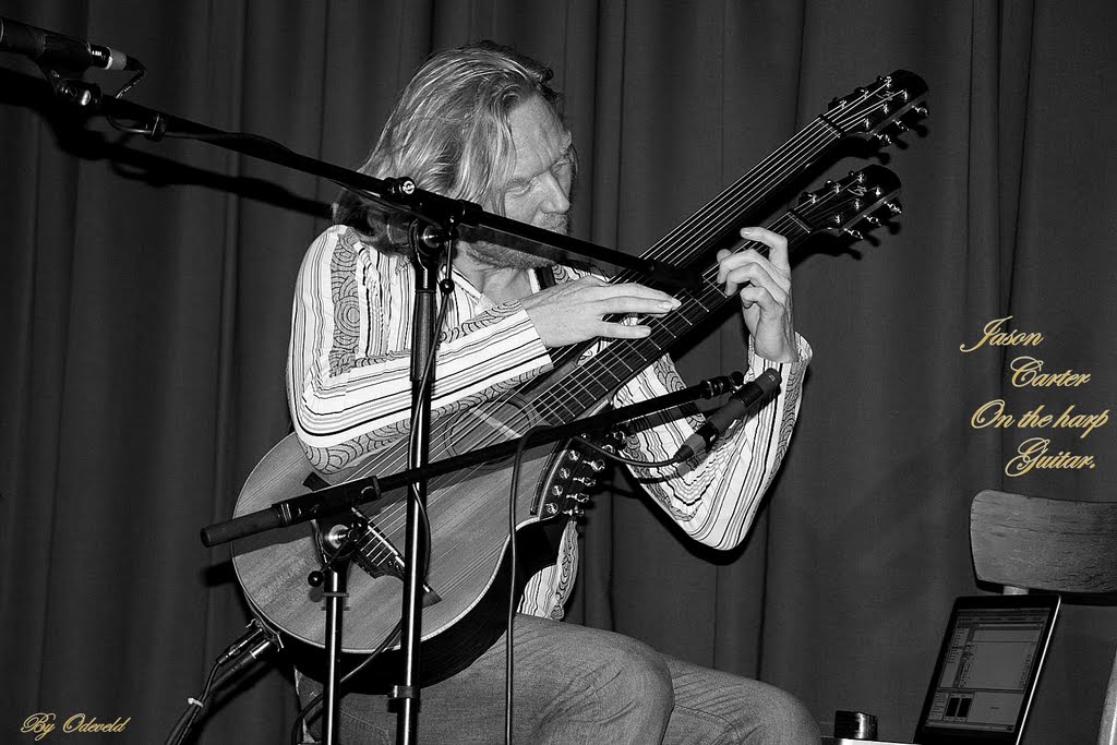 Jason Carter plays the harp guitar. Live in 't Ey, Belsele, Begium. by tweeodeveld