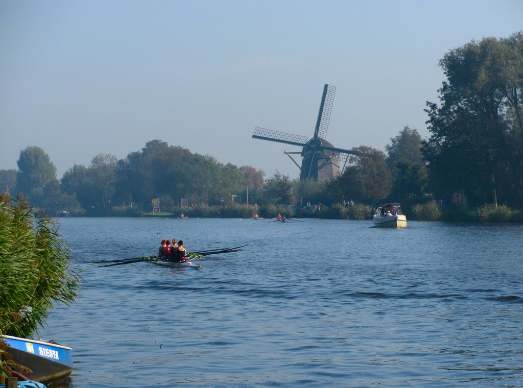 De Zwaan Molen and Rowers by dennyswaitress