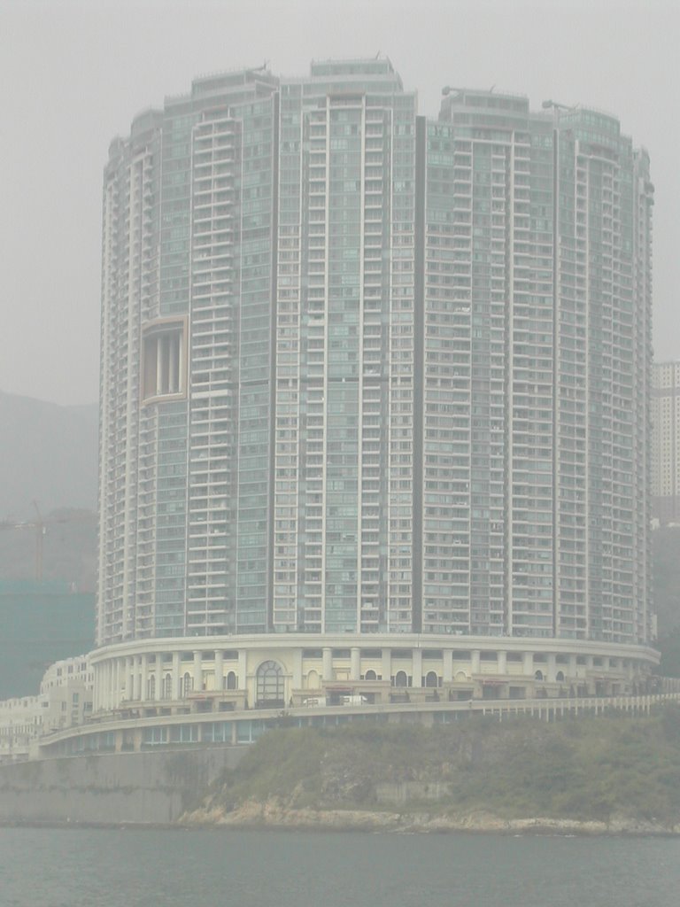 Hong Kong Round Building With a Big Hole by bugsvoyager