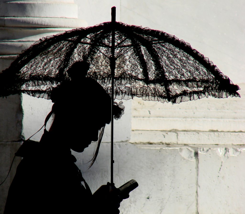 Girl in 19th century costume in front of the Dome of Lucca during the Cartoon Festival in November 2007 by Robert Gulyas