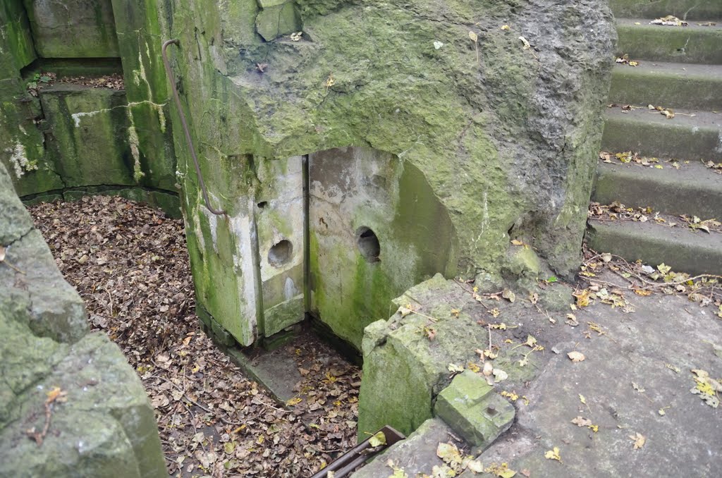 Dug out building of retractable gun turret (right wing) by Dick Wools