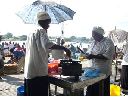 Preparing "chapati na supu ya pewza" at the fish market, Dar es Salaam by kikusi