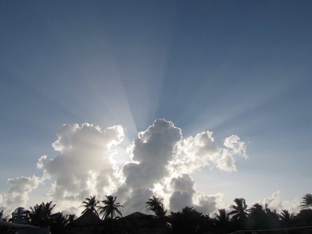 Belize Real Estate - Sun behind clouds by belizreaest