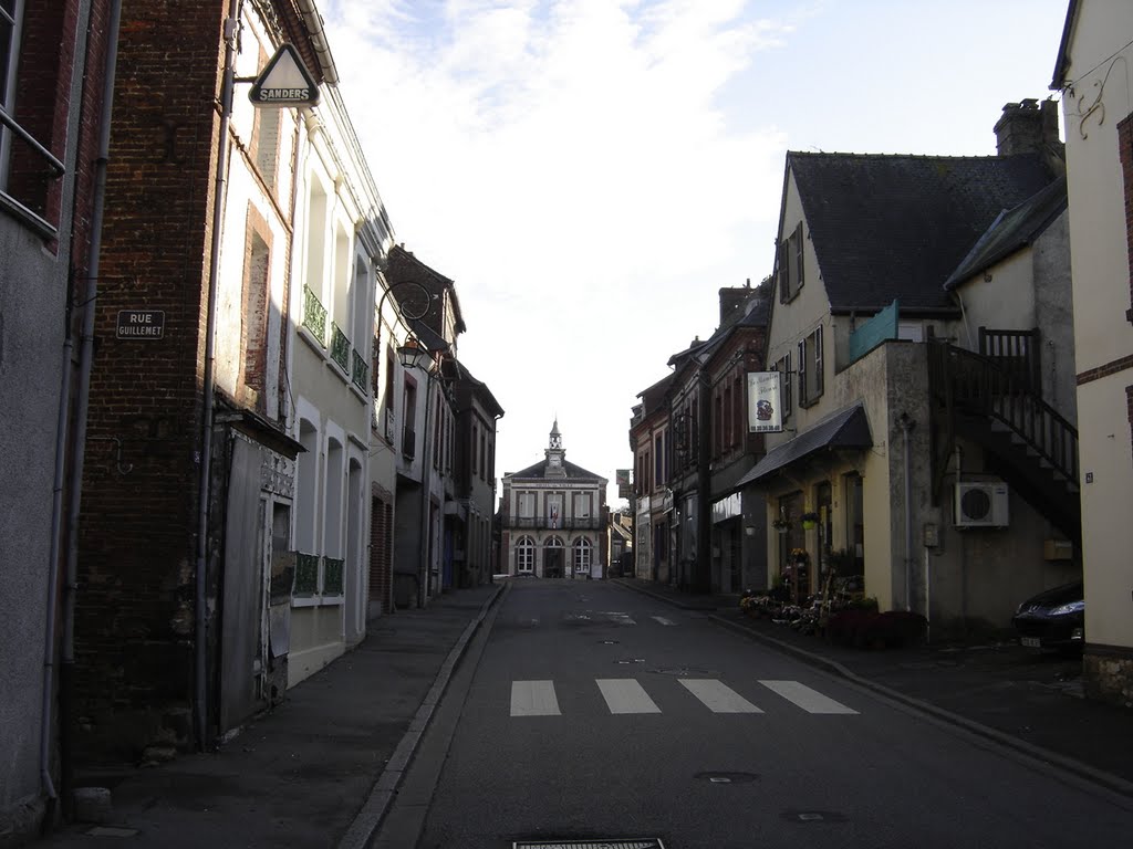 Rue principale à Moulins la Marche by Bernard DUPONT