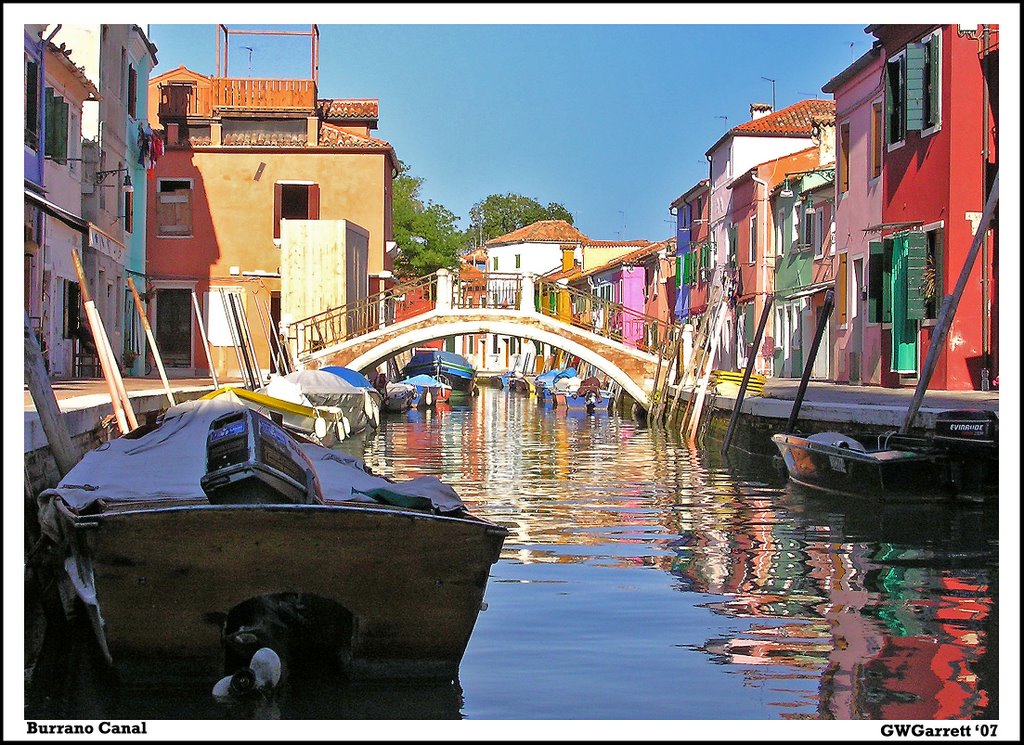 Burano bridge and canal 02 by Geoffrey Garrett