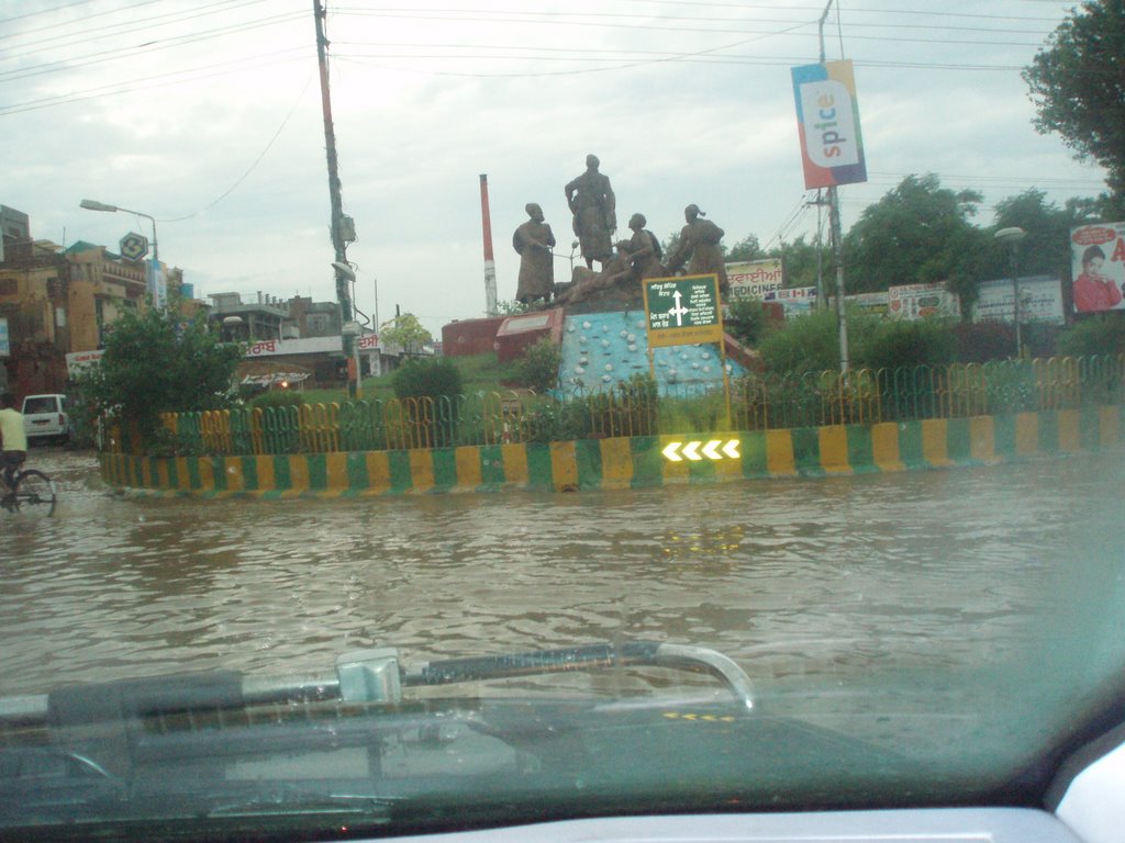 A traffic circle in Faridkot on a rainy day by faridkotiea