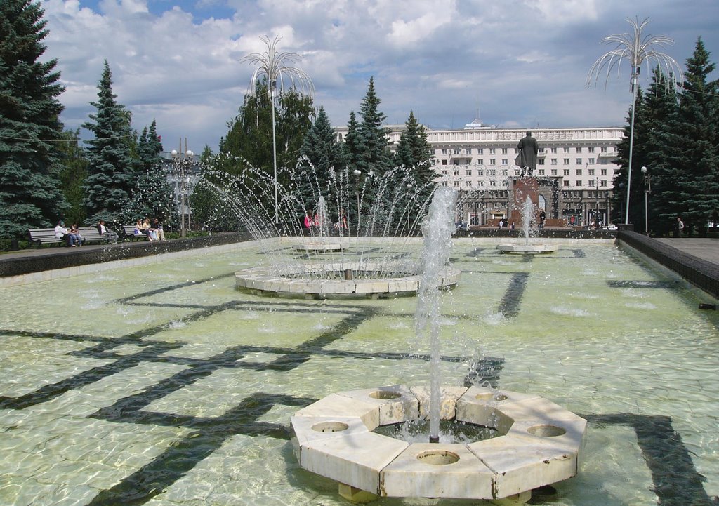 Fountain at the back of central city square "Square of Revolution" by loginovskikh