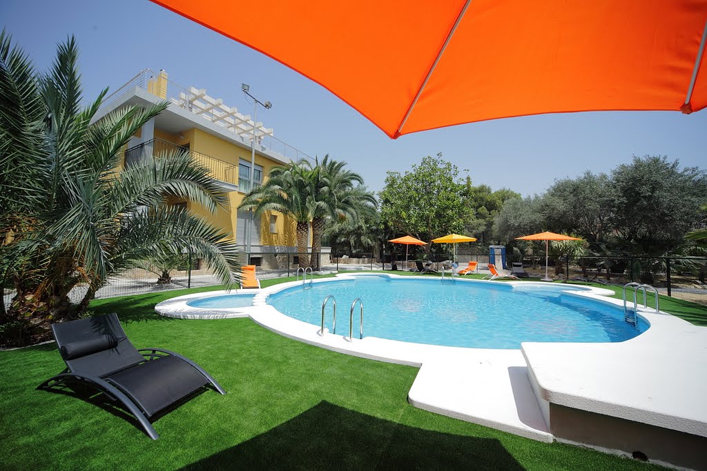 Piscina de los apartamentos El palmeral de Madaria by El Palmeral De Madaria