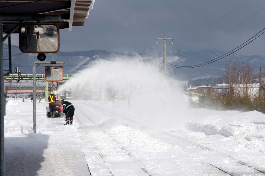 Clearing snow at Furano station by RodWilliams