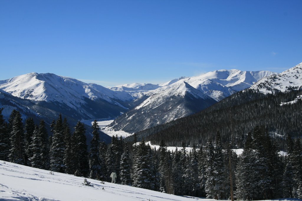 Climbing up the old lift line of Berthoud Pass Ski Area on the East side, looking back South West by Richard Ryer