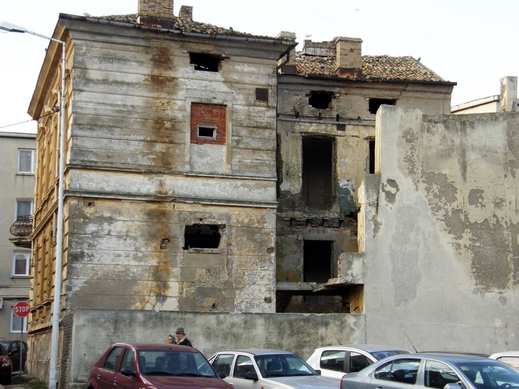 An old building in the old town by anitsirc