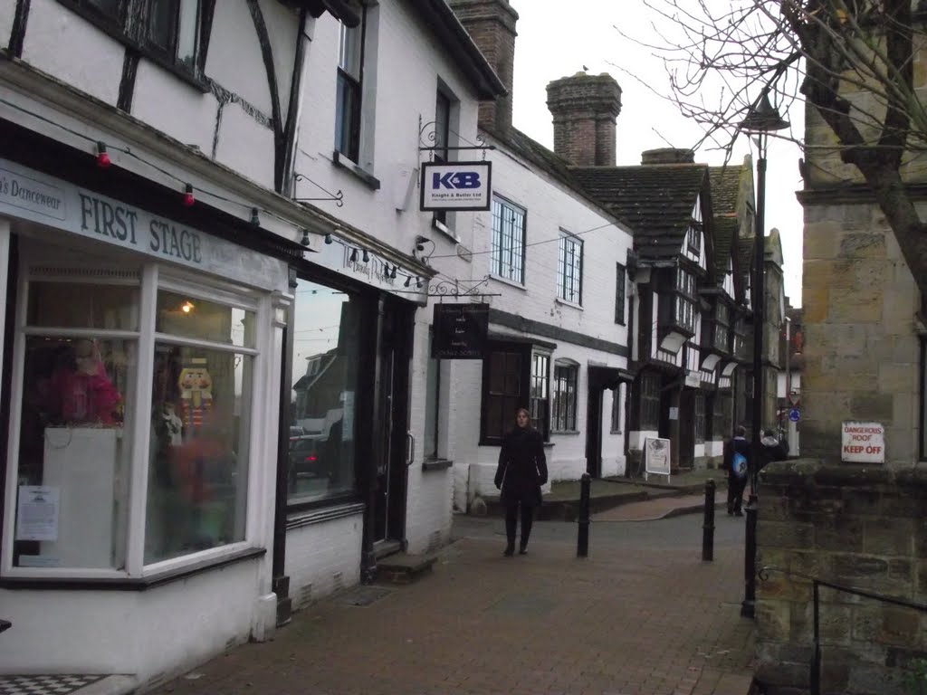 East Grinstead, the old shops by the war memorial by tonywatson