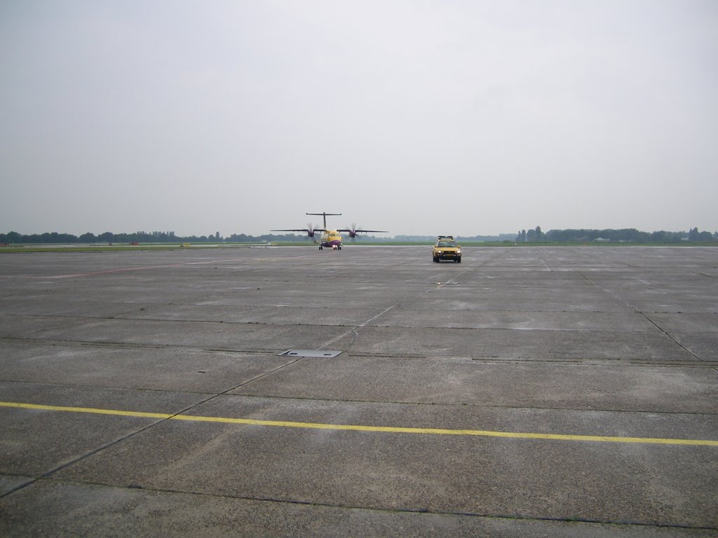 Ambulance Plane Landing - Rotterdam Airport - Rotterdam - Holland by Leo Roubos