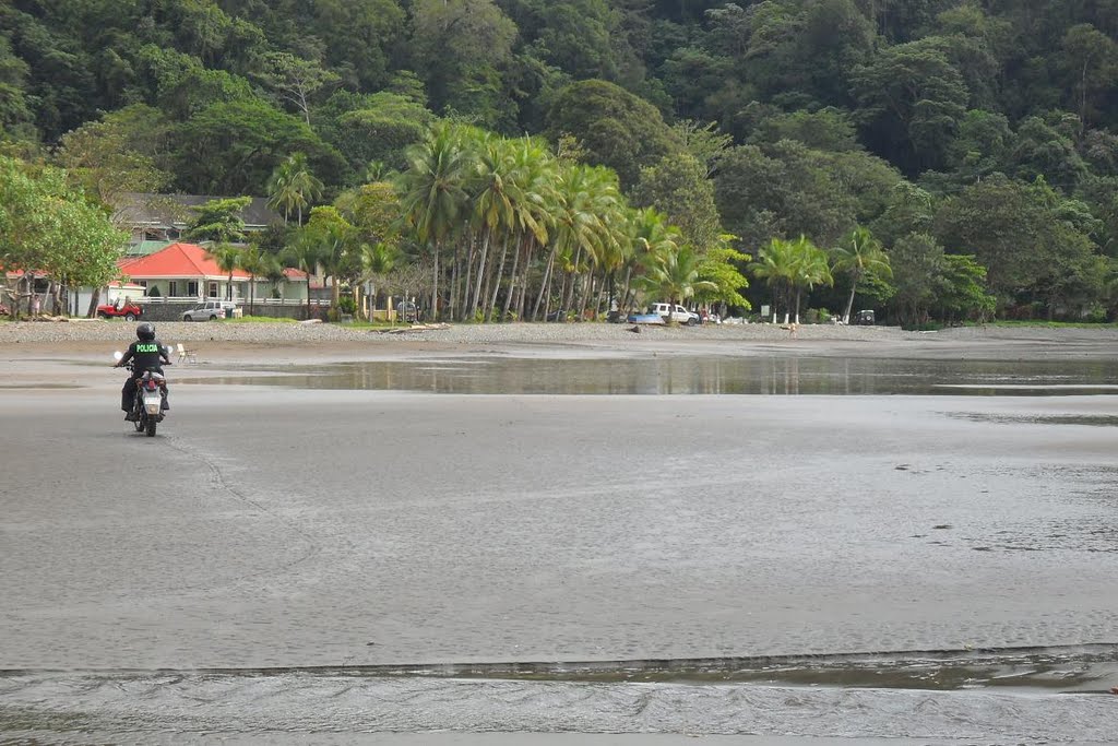 Policia patrol on the beach by Vencel Milei