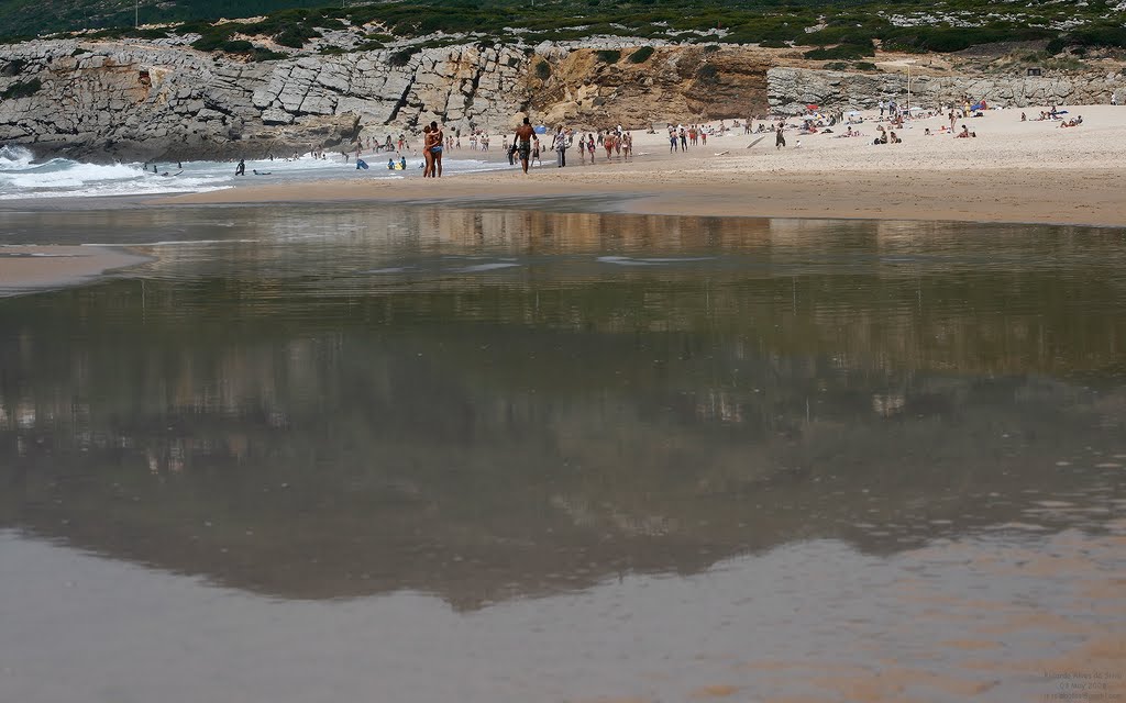 Mirrored Peninha on Guincho beach by Sunseaguls