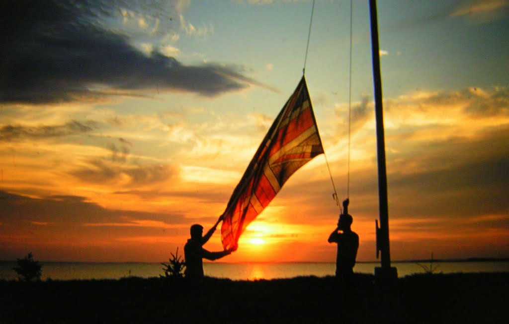 Lowering the flag, near River John, Nova Scotia by Tom Dudones