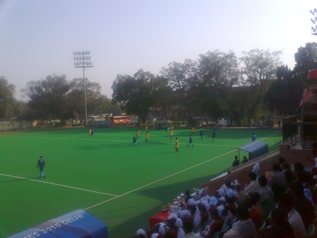 Hockey match in progress at Major Dhyan Chand Stadium, New Delhi by Suchita Xaxa