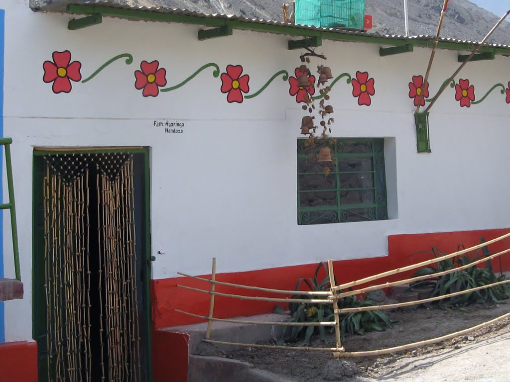 Door , window and flowers in Antioquía by Eva Lewitus