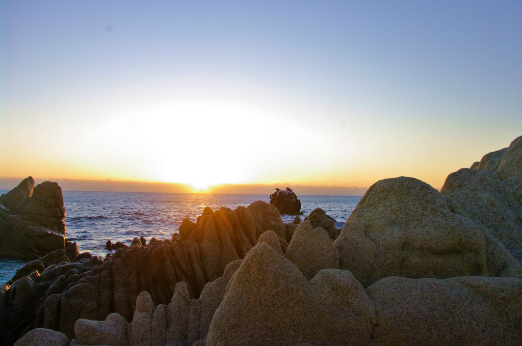 Rocks and morning sunlight by John Greaves