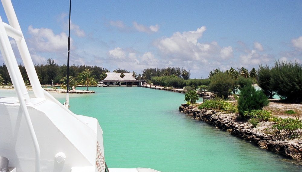 ARRIVING AT BORA BORA AIRPORT TERMINAL by Del Russel