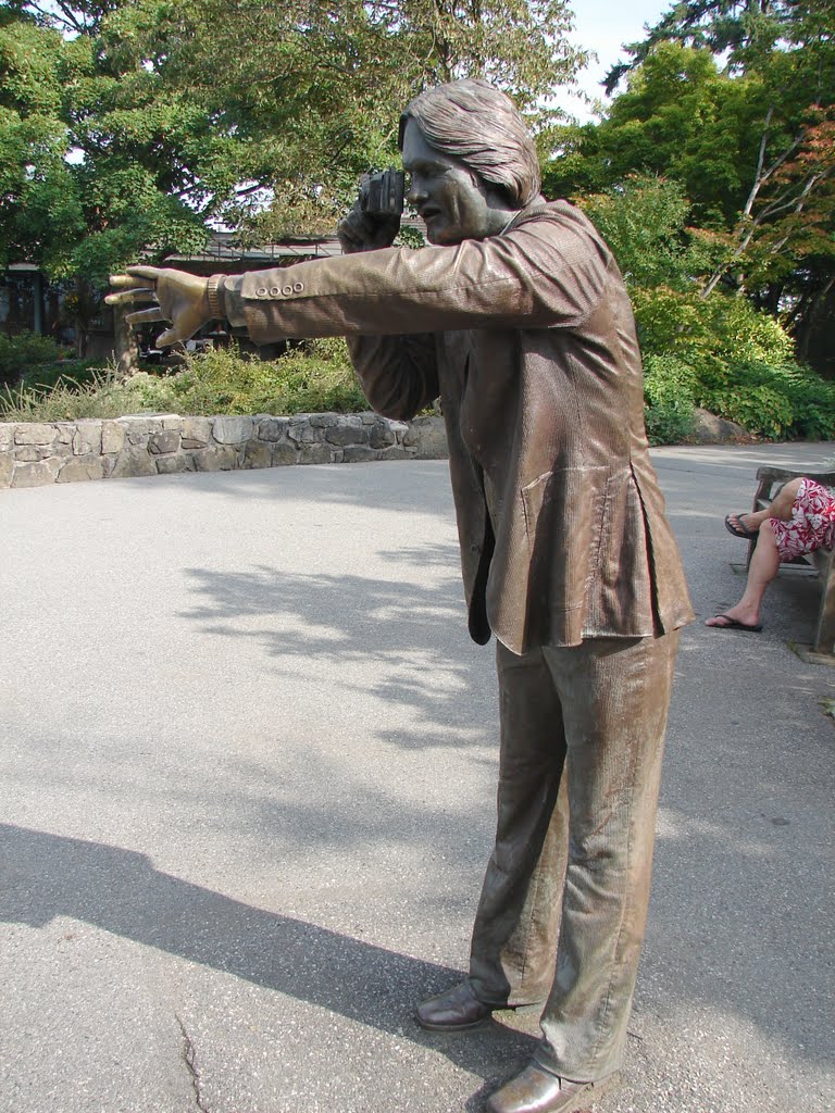 Bronze Statue called "Photo Session" of Person Taking Picture at Queen Elizabeth Park in Vancouver Canada by Joseph Hollick