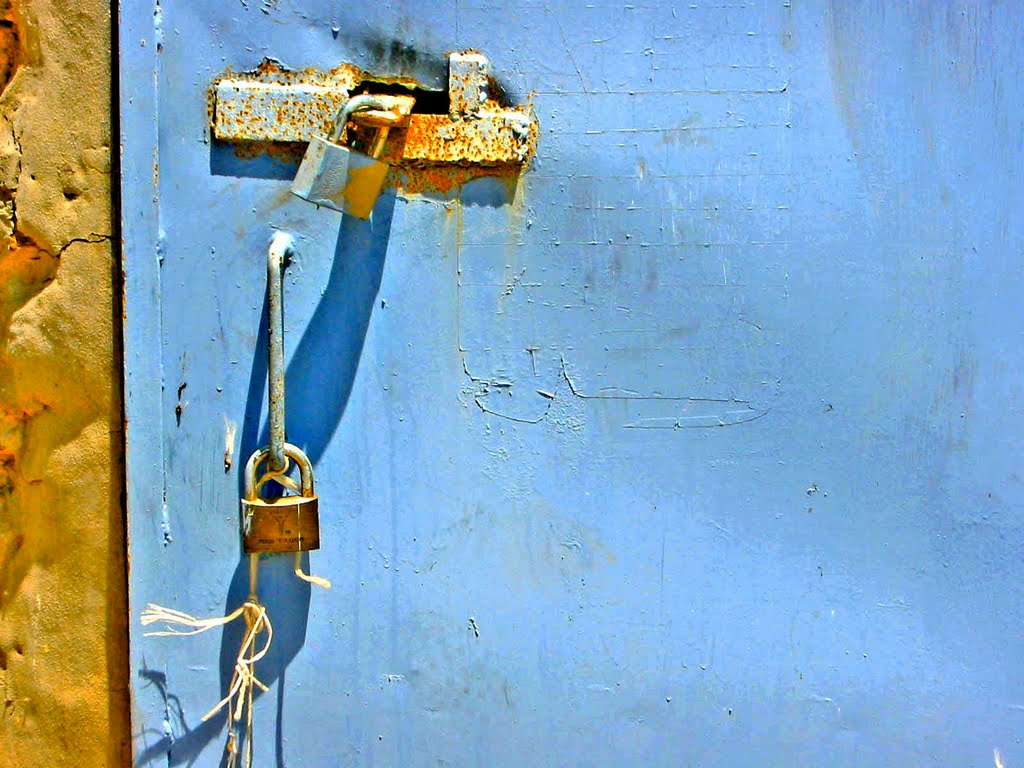 Locks on door by Eva Lewitus