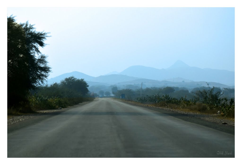 View of Mountains from Roadside by A Khan