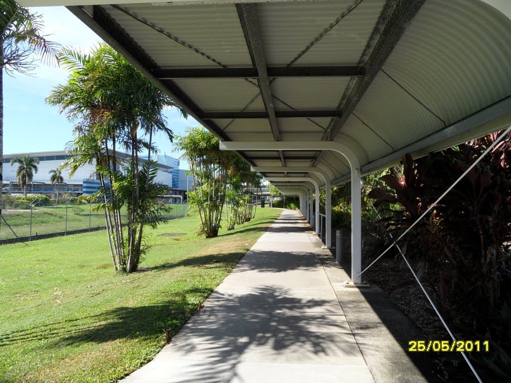 Covered Walkway area between Domestic and International Terminals at CAIRNS Airport, on 25-05-2011 by Peter John Tate,