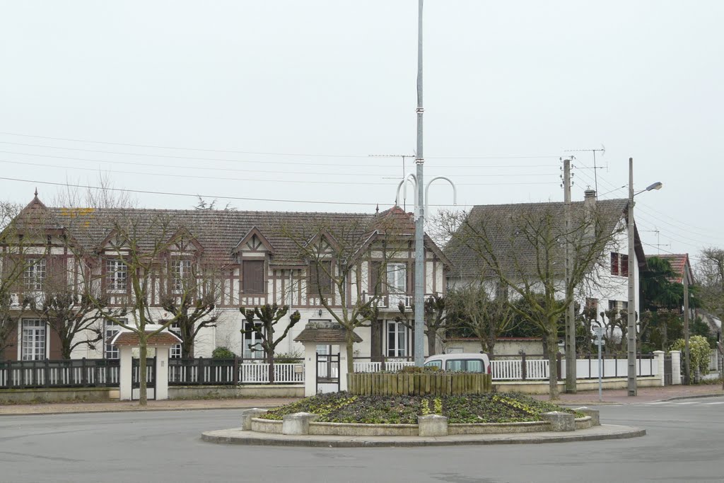 Aubergenville, quartier Elisabethville, maison et giratoire sur la place de Louvain by tofil44