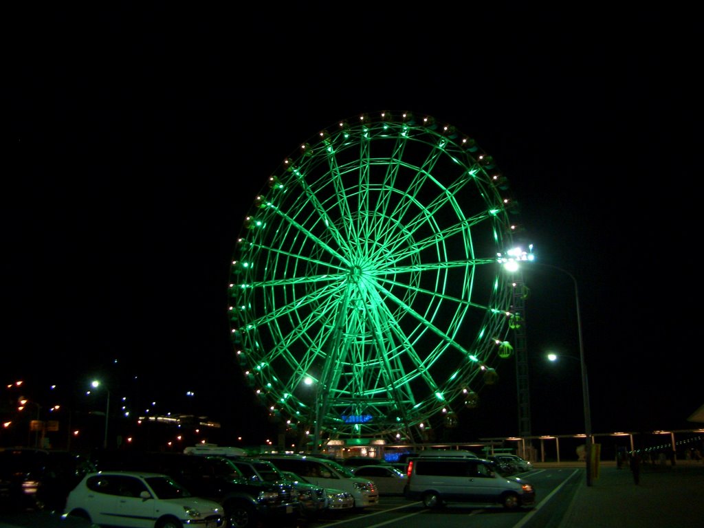 Ferris wheel by street watcher