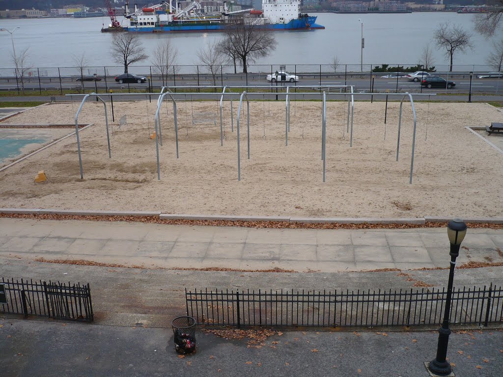 View of traveling rings from upper Hudson Beach Cafe area by IraGersh