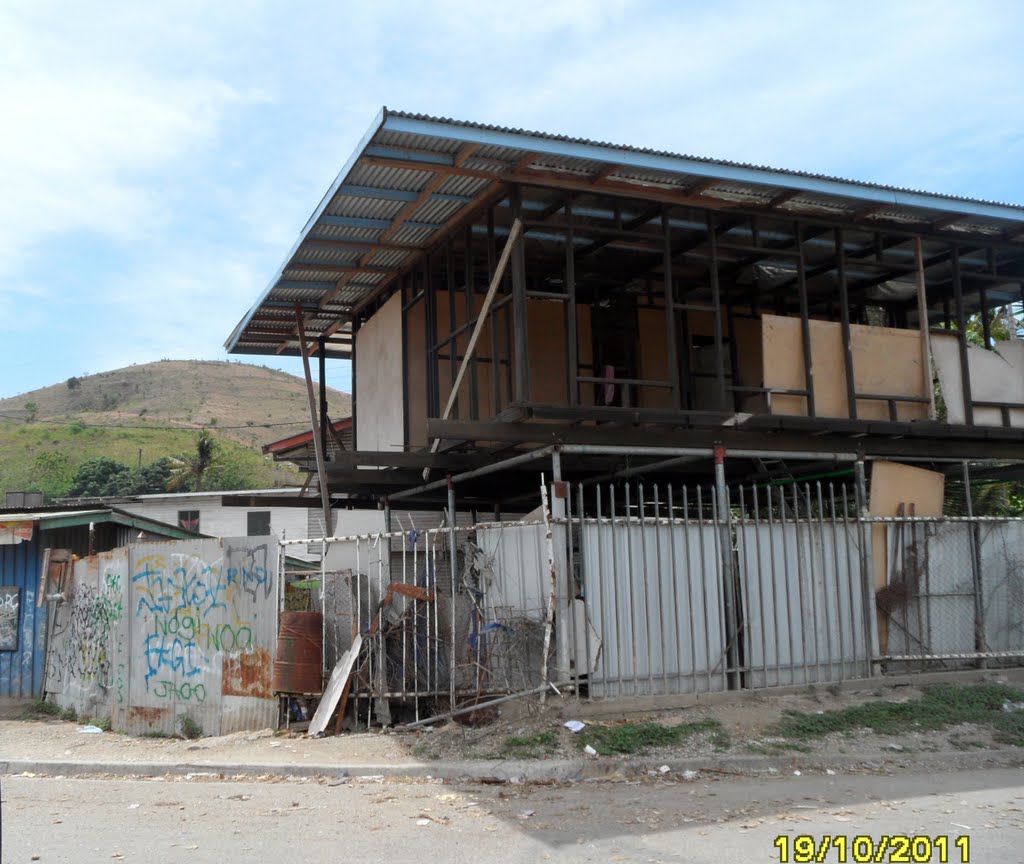 2 Story unfinished local Building on corner of Kunai and Cananga Streets in HOHOLA area, on 19-10-2011 by Peter John Tate