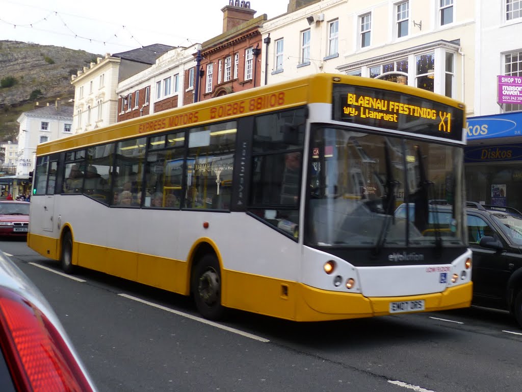 941. the x1 to blaenau ffestiniog via llanrwist. mostyn street, llandudno, north wales. dec. 2011. by mick french