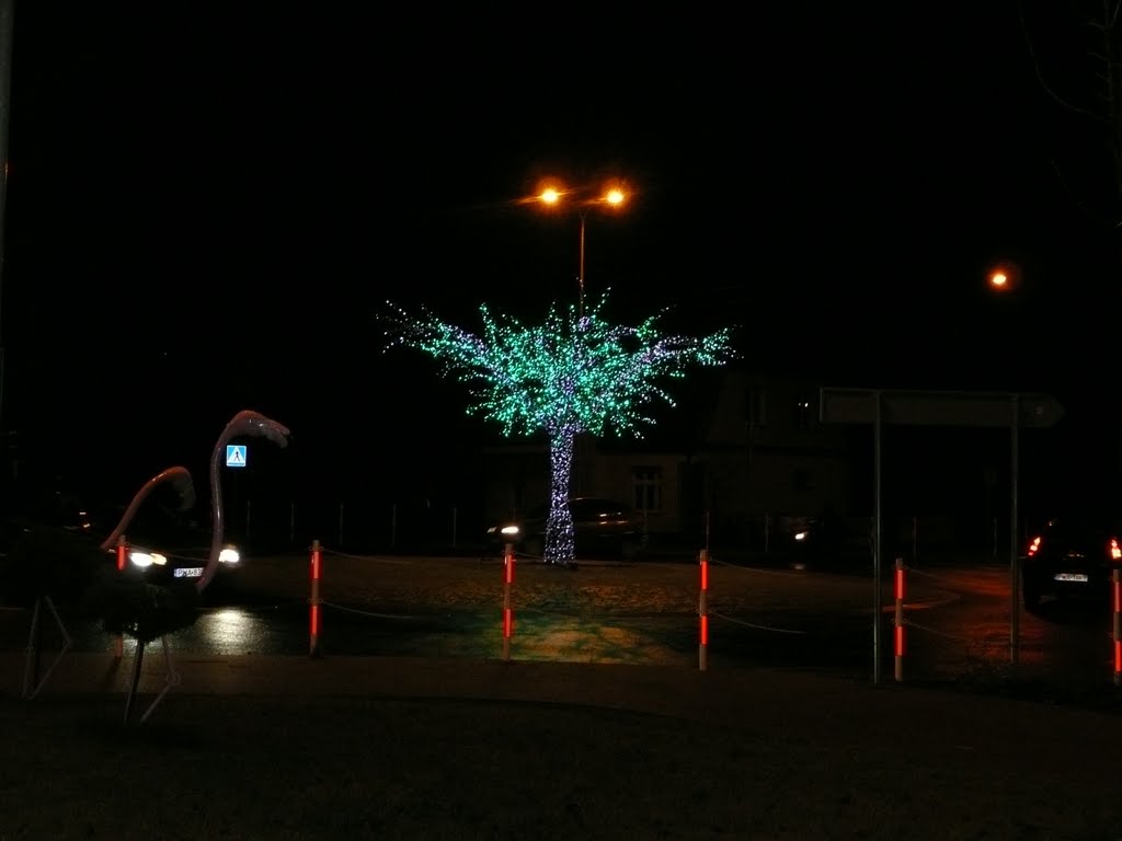 Decoration roundabout on city street by GiselaJ