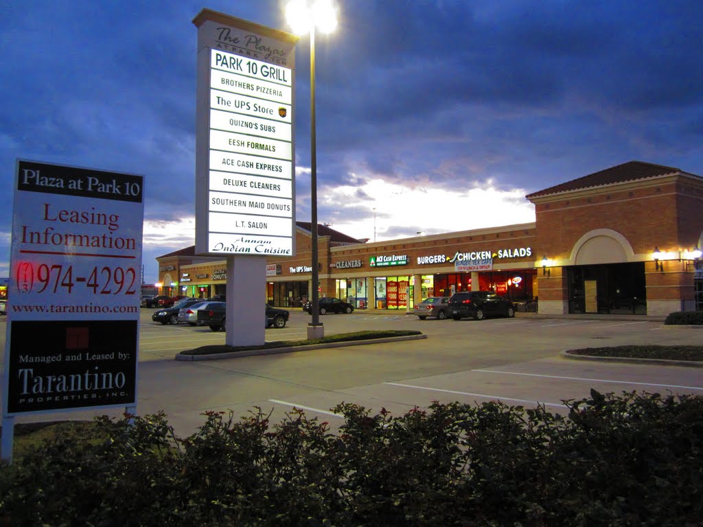 The Plazas at Park Ten - Sign with list of business establishments in the shopping center by WOLFGANG HOUSTON WEST