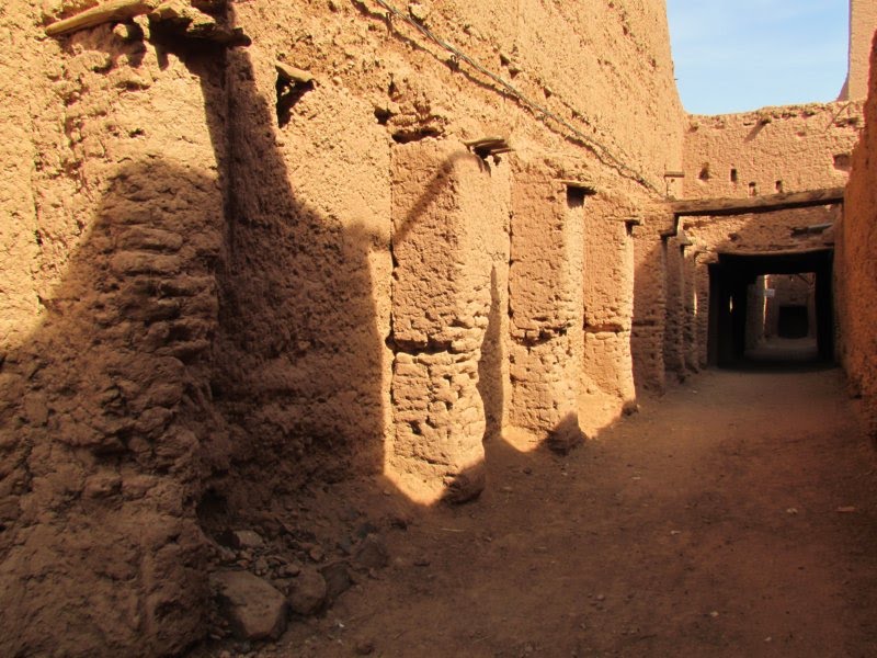 Morocco. 4 km from M'hamid driving back to Zagora lies the small desert town Oulad Driss. by Linda De Volder