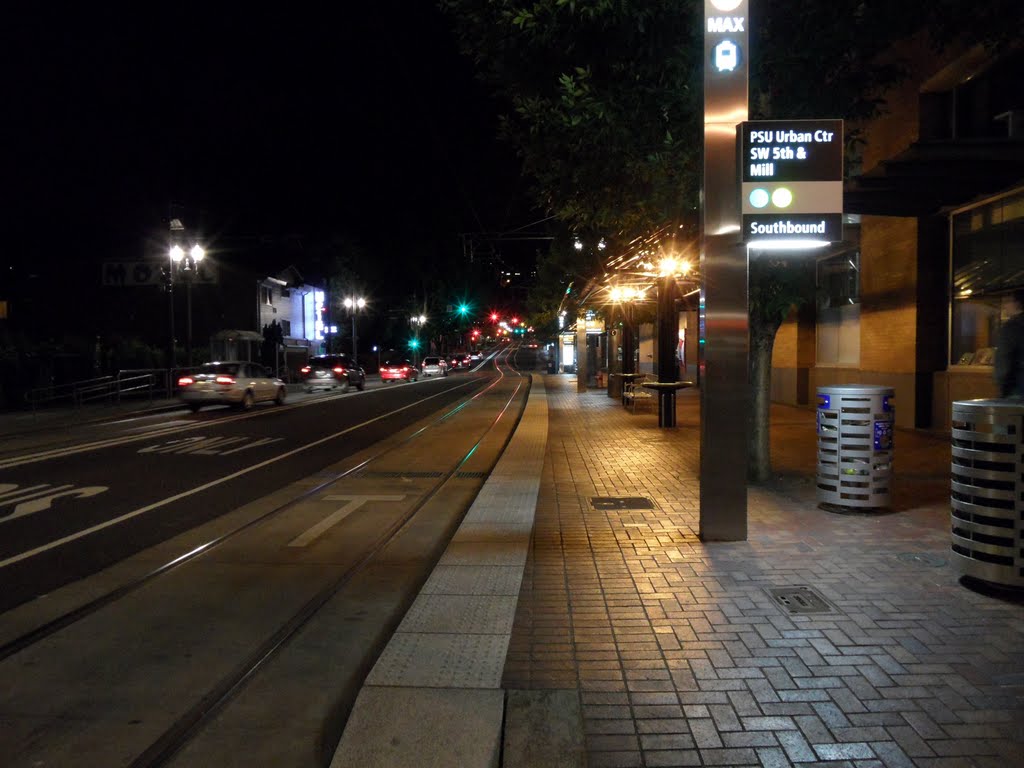 Night at the PSU Urban Center light rail station by IngolfBLN