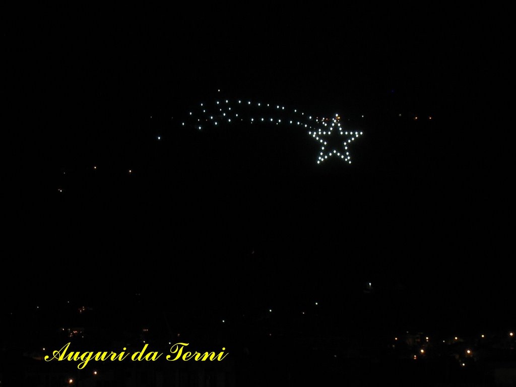 MERRY CHRISTMAS AND HAPPY NEW YEAR - La stella di Miranda con i circa 49.000 metri quadrati di superficie e una coda lunga 280 metri, sovrasta la città di Terni durante le feste di Natale.       The star of Miranda with approximately a 49.000 meters square of surface and long tail 280 meters, surpasses the city of Terni (Italy) during the Christmas festivities. by Dancos