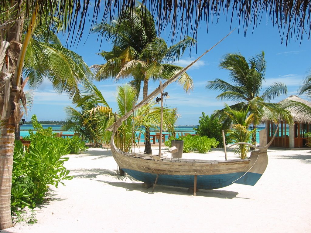 Boat in Beach BBQ Restaurant, Full Moon Resort, Maldives by Mark Poley