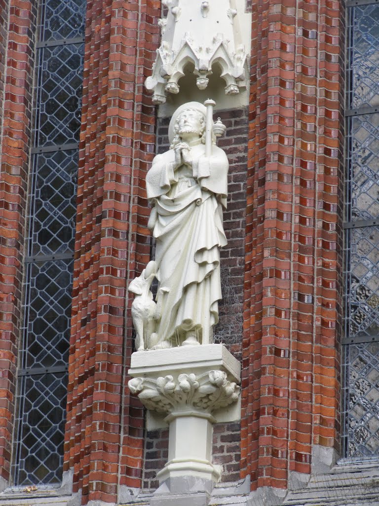 Statue of Saint Rochus at the facade of Saint Rochus' church by Willem Nabuurs