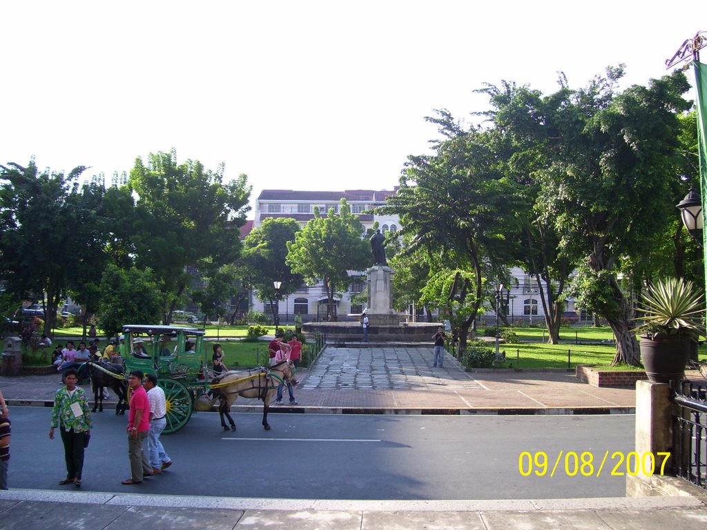 Infront of Manila Cathedral by Istvan Hidvegi