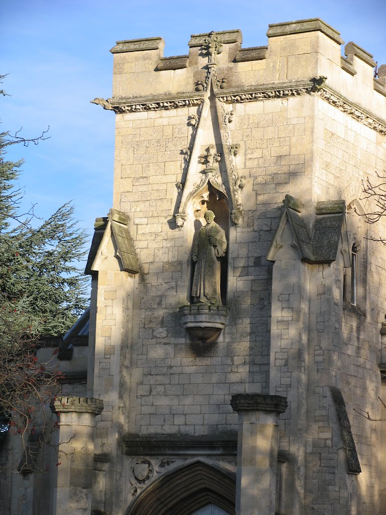 Statue over Cheltenham College entrance lodge by Terry Jacombs