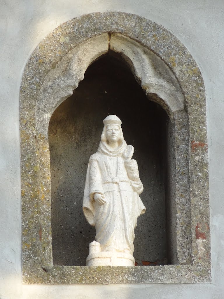 Statue of a saint in the entrance gate of the Kruisherenklooster by Willem Nabuurs