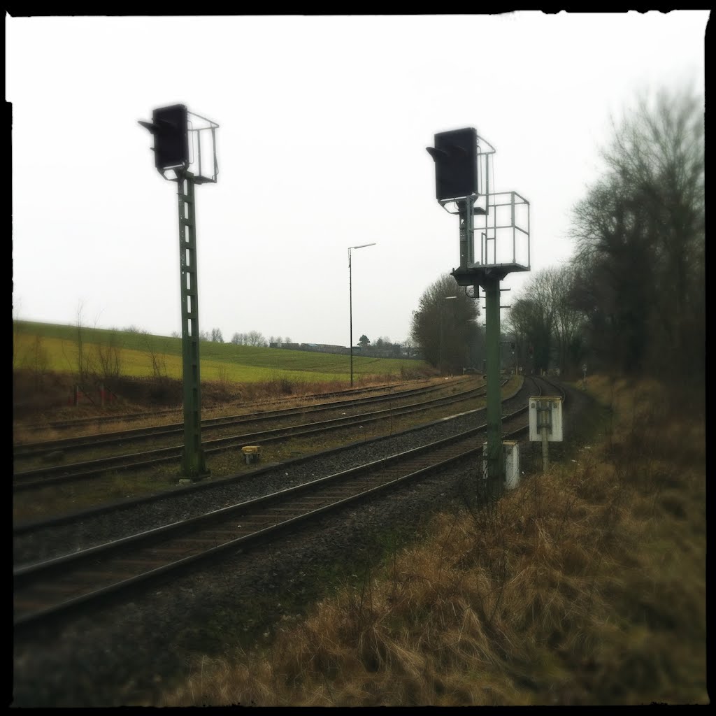 Waiting for the train on a dusty day by touring-treiber