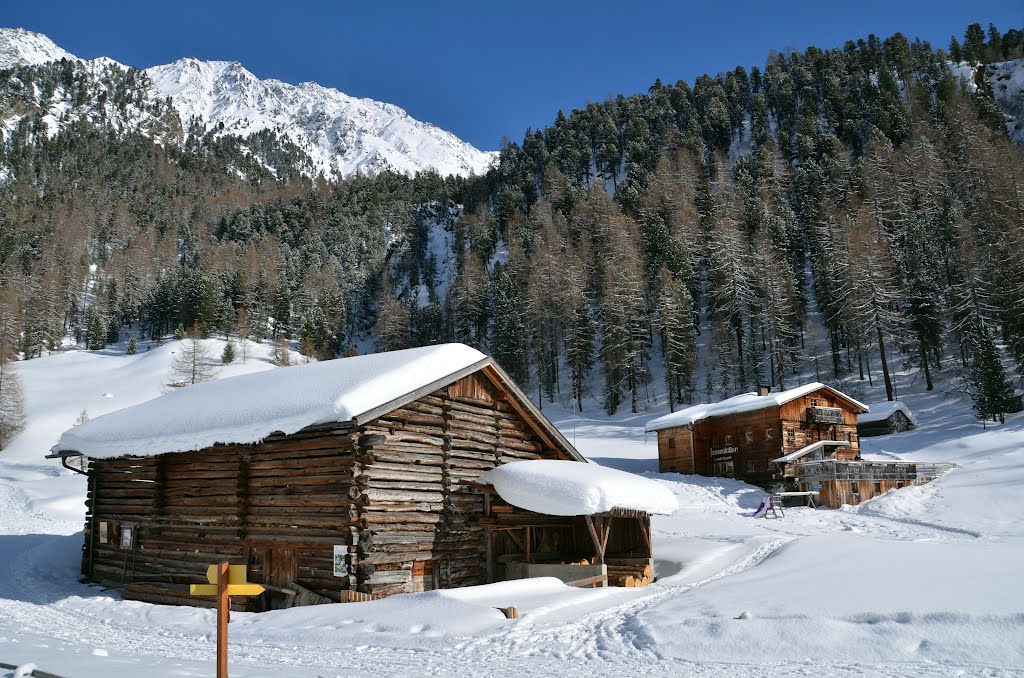 The folkloristic Larstigalmhutte for fine refreshments and a sunny terrace some 1770 m heigth by Henq