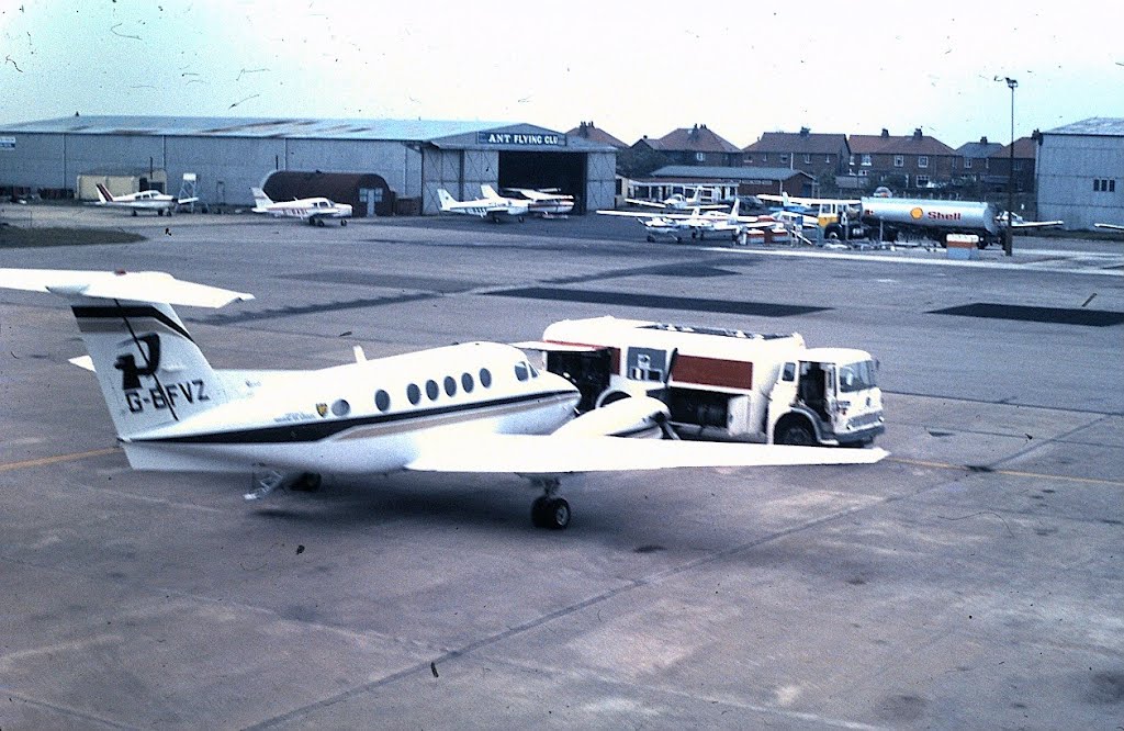 A Beechcraft Kingair refuelling at Blackpool Airport (1982) by SHoweMBOU