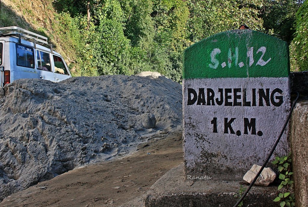 Milestone, Darjeeling, India by Ranatu Ghatak