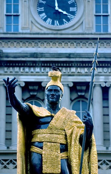 King Kamehameha statue in front of the Ali'iolani Hale, across from 'Iolani Palace by photosofaloha